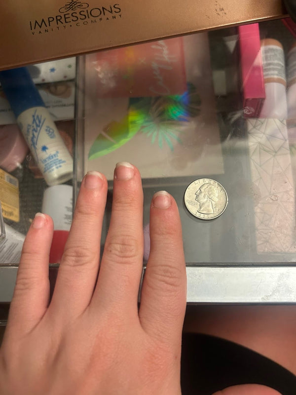 Example: left fingers beside a coin