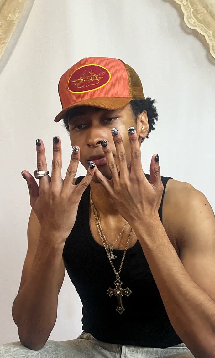 A Tali's Nailz client wearing a custom set